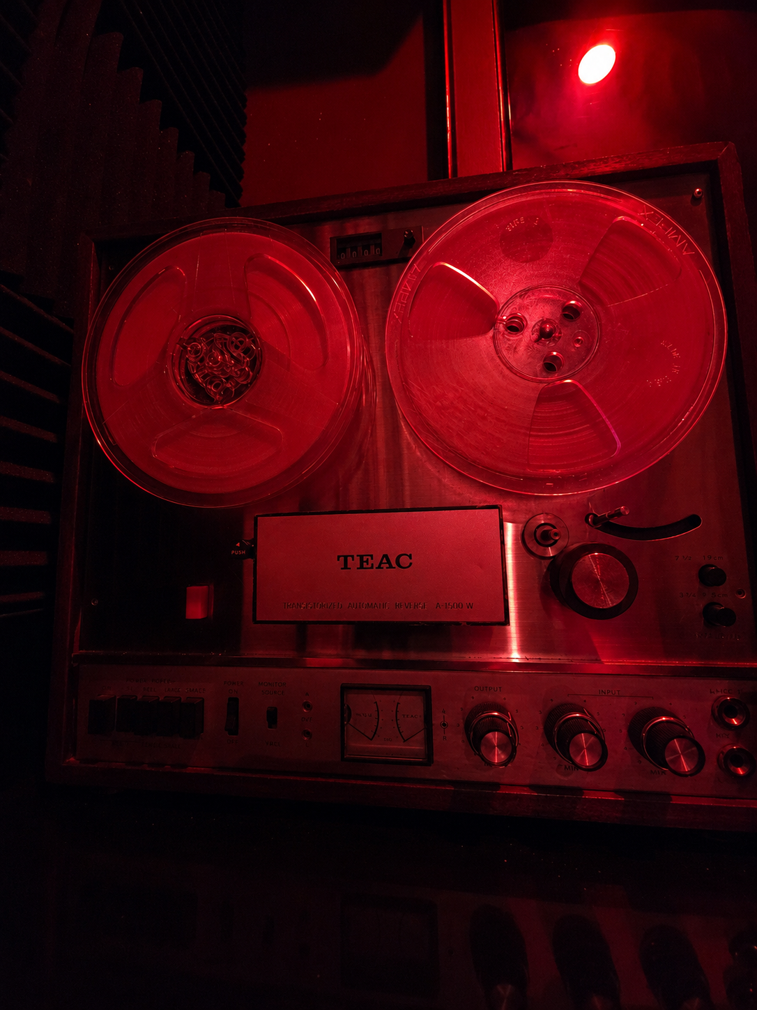 Close-up of reel-to-reel tape equipment inside Mogul’s Secret Scandal at Escape Cocoa Beach.